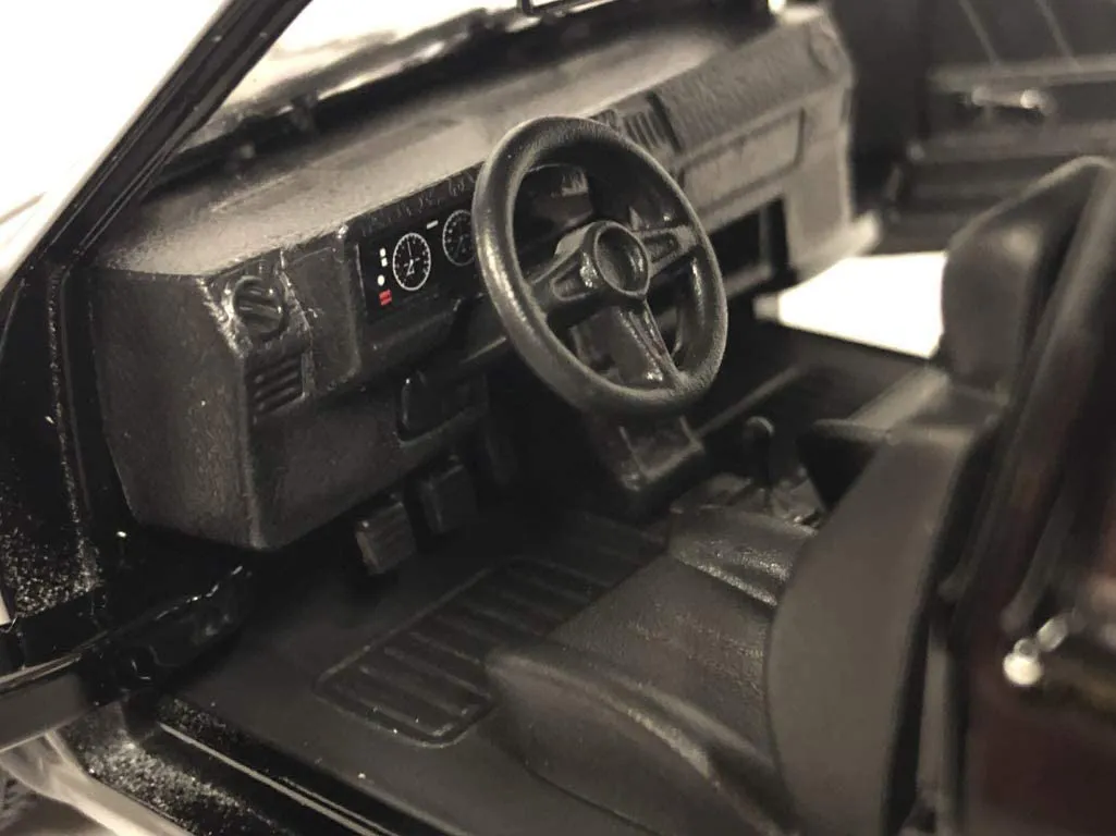 Bburago - Modellauto - VW Golf 1 GTI 1979 (schwarz, Maßstab 1:24)